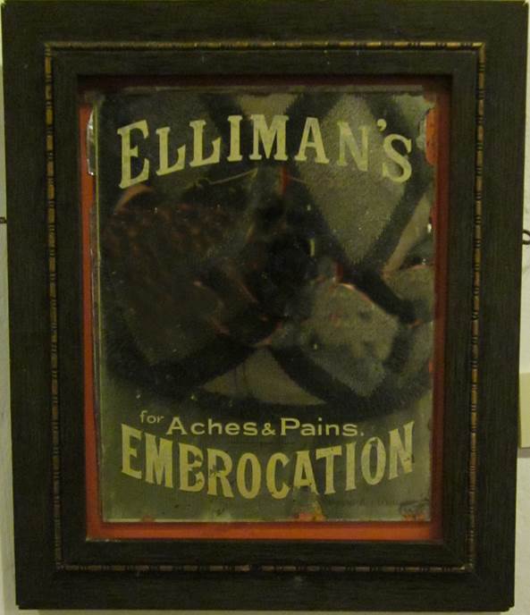 Mirror advertising Elliman's Embrocation. 100 years ago it was hung at Spring Villa in market Lavington.