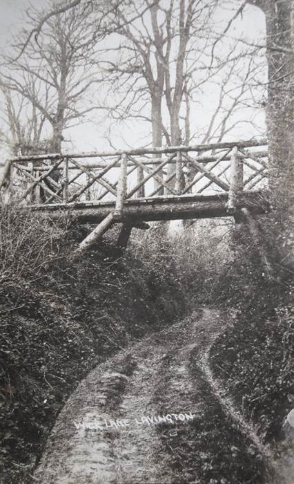 Wick Lane, Market Lavington and a rustic bridge. The photo dates from 1914.