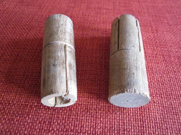 Could these mystery items, found under the floorboards at 21 Church Street, be wall plugs?