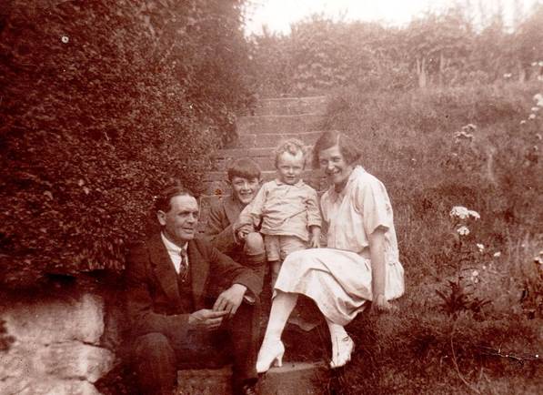 The Godfrey family in the garden at their home - the shop in Easterton. About 1927