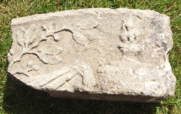 Carved stone dug up just outside market Lavington churchyard, near the Community Hall