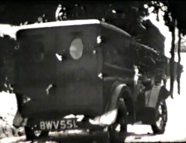 Butcher's van in the snow in the 1930s