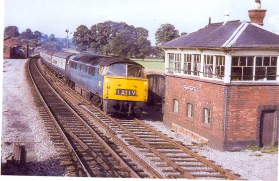 Western Emperor passes Lavington Signal Box in about 1965