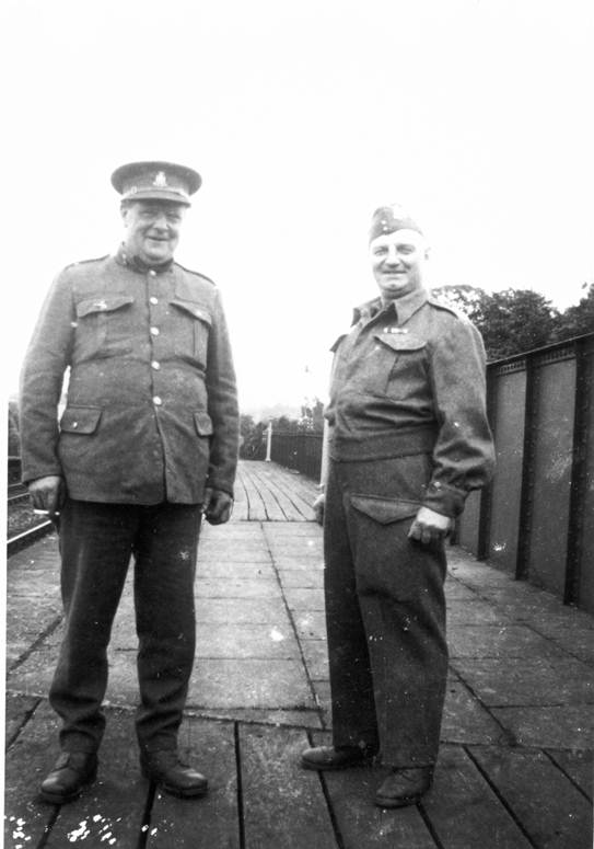 Xharlie Spreadbury and Sid Mullings on the platform of Lavington Station during World War II
