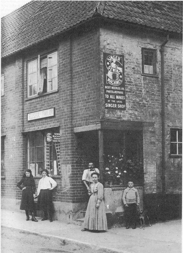 The Elisha family outside their shop in about 1911