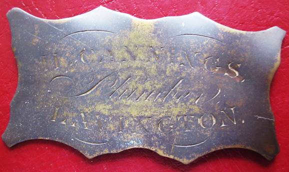 H Cannings, plumber - a trade plate