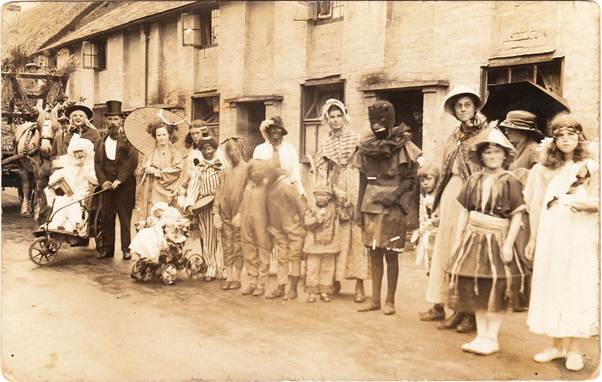 A Market Lavington and Easterton Hospital Week carnival lines up in Easterton - about 1920