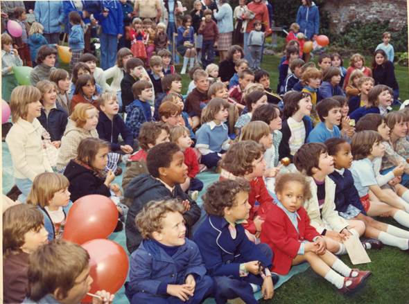 Happy children iat a Market Lavington Church Fete in 1976
