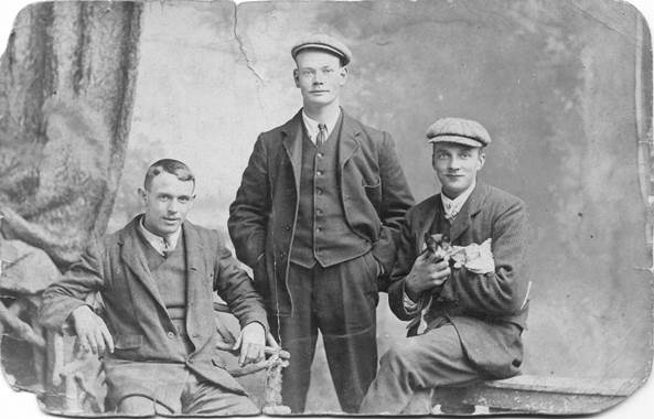 Three men on the front of the card