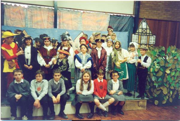A performance at St Barnabas School in the 1980s. There are lots of people to recognise there.