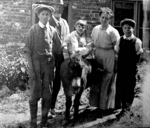 Wilf, Sam, Bertha, Jane and Bill Moore. The donkey's name is not known.